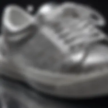 Close-up of sparkling details on silver tennis shoes