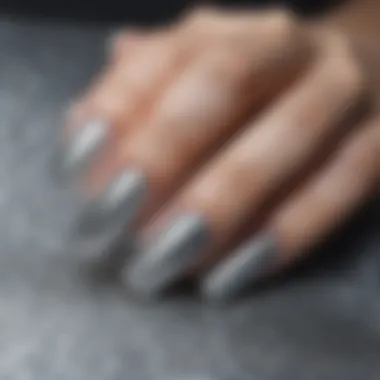 Close-up of silver glitter press-on nails highlighting their intricate details and shine