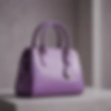 Elegant small purple handbag displayed against a minimalist backdrop